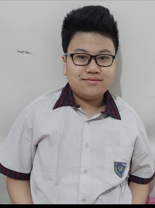 Alvino in his school uniform in 2022